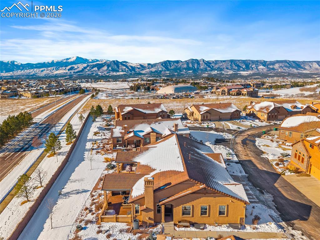 12988 Cupcake Heights Colorado Springs, CO 80921 - Photo 32 of 39 an aerial view of residential houses with outdoor space