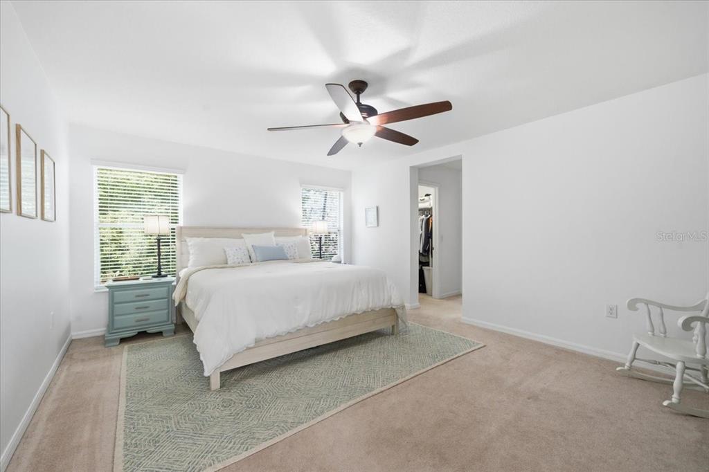 12330 North Rome Avenue Tampa, FL 33612 - Photo 18 of 33 a bedroom with a bed and a ceiling fan