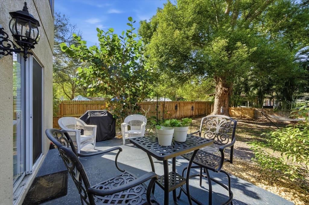 12330 North Rome Avenue Tampa, FL 33612 - Photo 30 of 33 a view of a house with backyard and sitting area