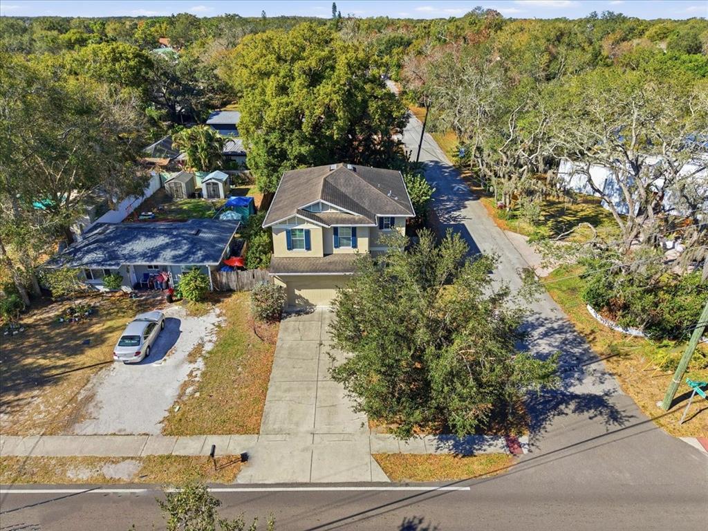 12330 North Rome Avenue Tampa, FL 33612 - Photo 4 of 33 an aerial view of a house with yard