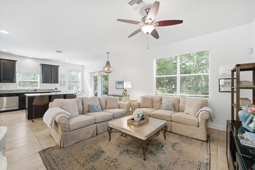 12330 North Rome Avenue Tampa, FL 33612 - Photo 5 of 33 a living room with furniture ceiling fan and a window
