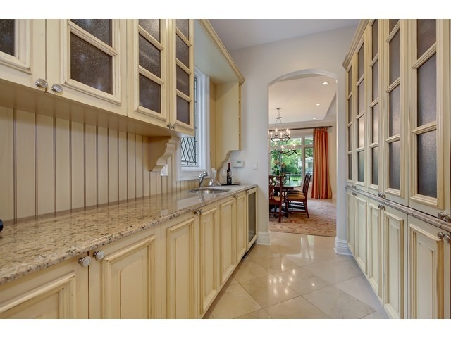 Undisclosed Address Hinsdale, IL 60521 - Photo 11 of 30 a bathroom with a sink a mirror and a bathtub