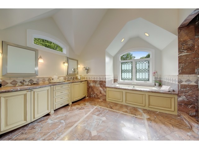Undisclosed Address Hinsdale, IL 60521 - Photo 15 of 30 a large bathroom with a large window and double vanity