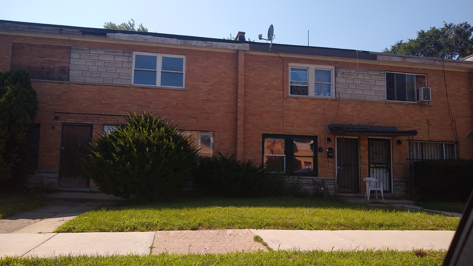 Undisclosed Address Chicago, IL 60620 - Photo 2 of 7 a view front of house with yard