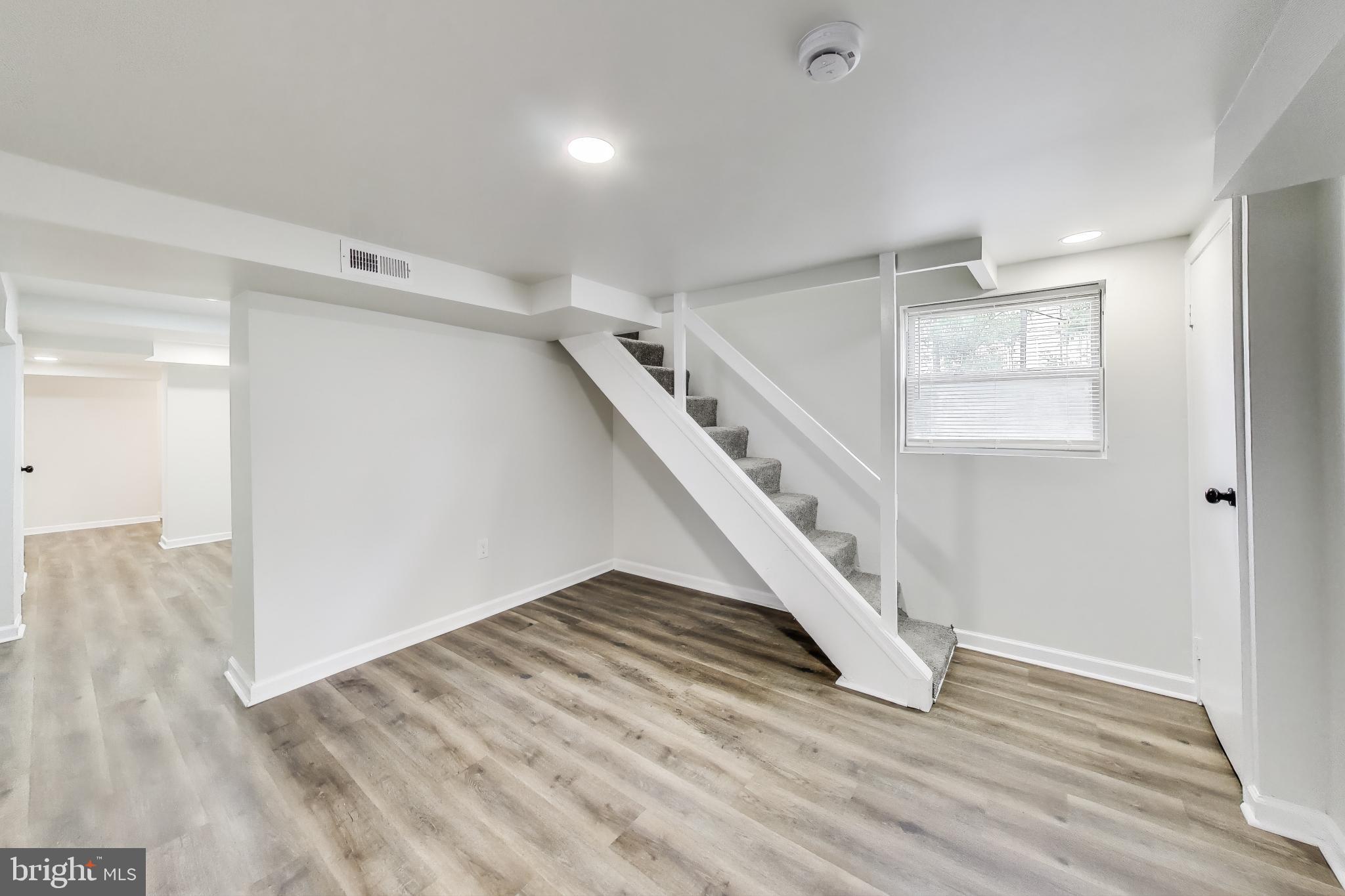 1 Maple Avenue Baltimore, MD 21206 - Photo 20 of 53 a view of entryway and hall with wooden floor