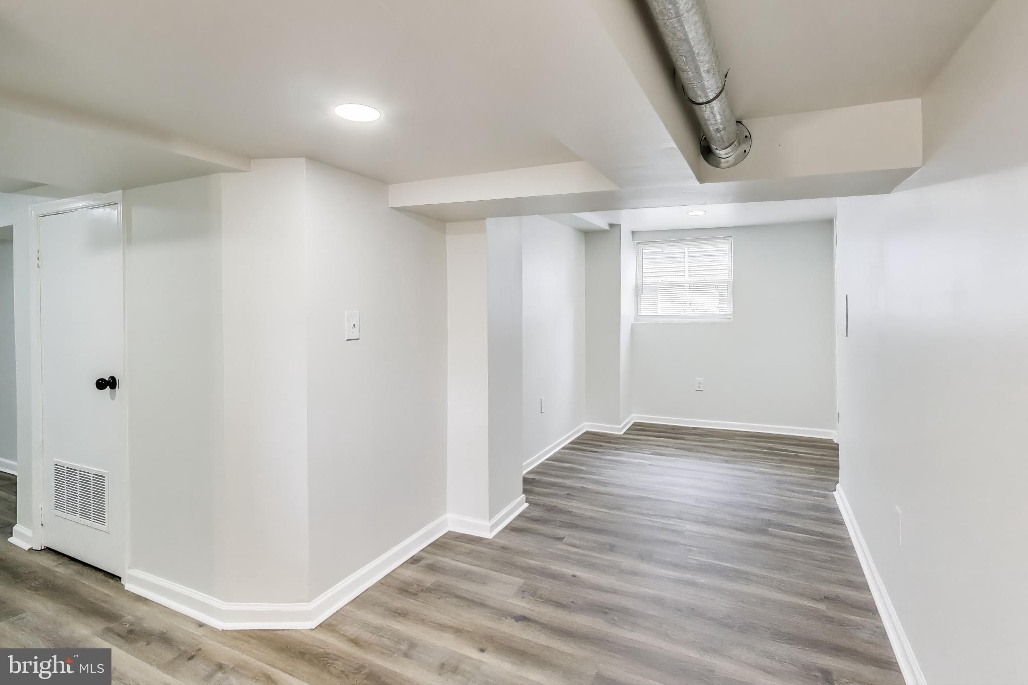 1 Maple Avenue Baltimore, MD 21206 - Photo 22 of 53 wooden floor in an empty room