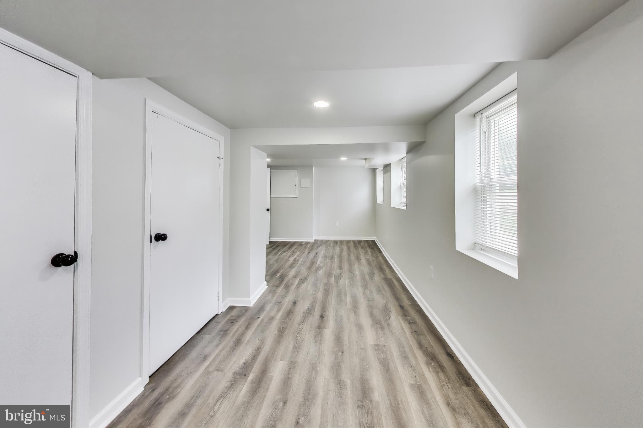 1 Maple Avenue Baltimore, MD 21206 - Photo 25 of 53 a view of a room with wooden floor closet and windows