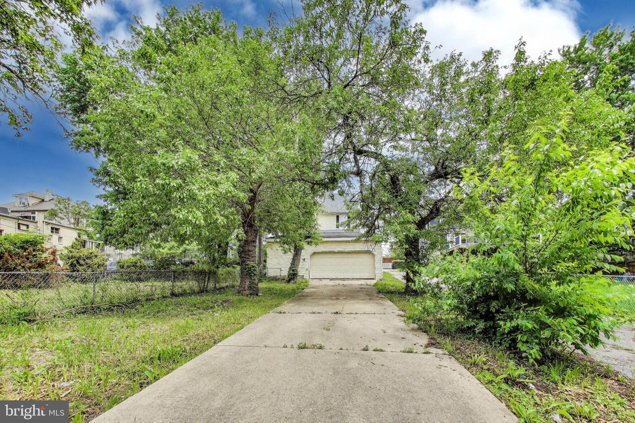 1 Maple Avenue Baltimore, MD 21206 - Photo 53 of 53 a pathway of a garden