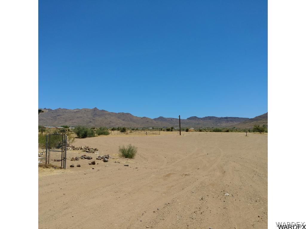 586 Bacobi Road Golden Valley, AZ 86413 - Photo 6 of 36 a view of lake and mountain