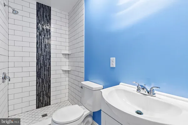 a bathroom with a sink and a toilet