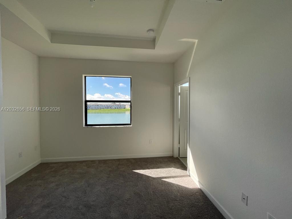 10144 Southwest 228th Terrace Miami, FL 33190 - Photo 16 of 23 a view of an empty room