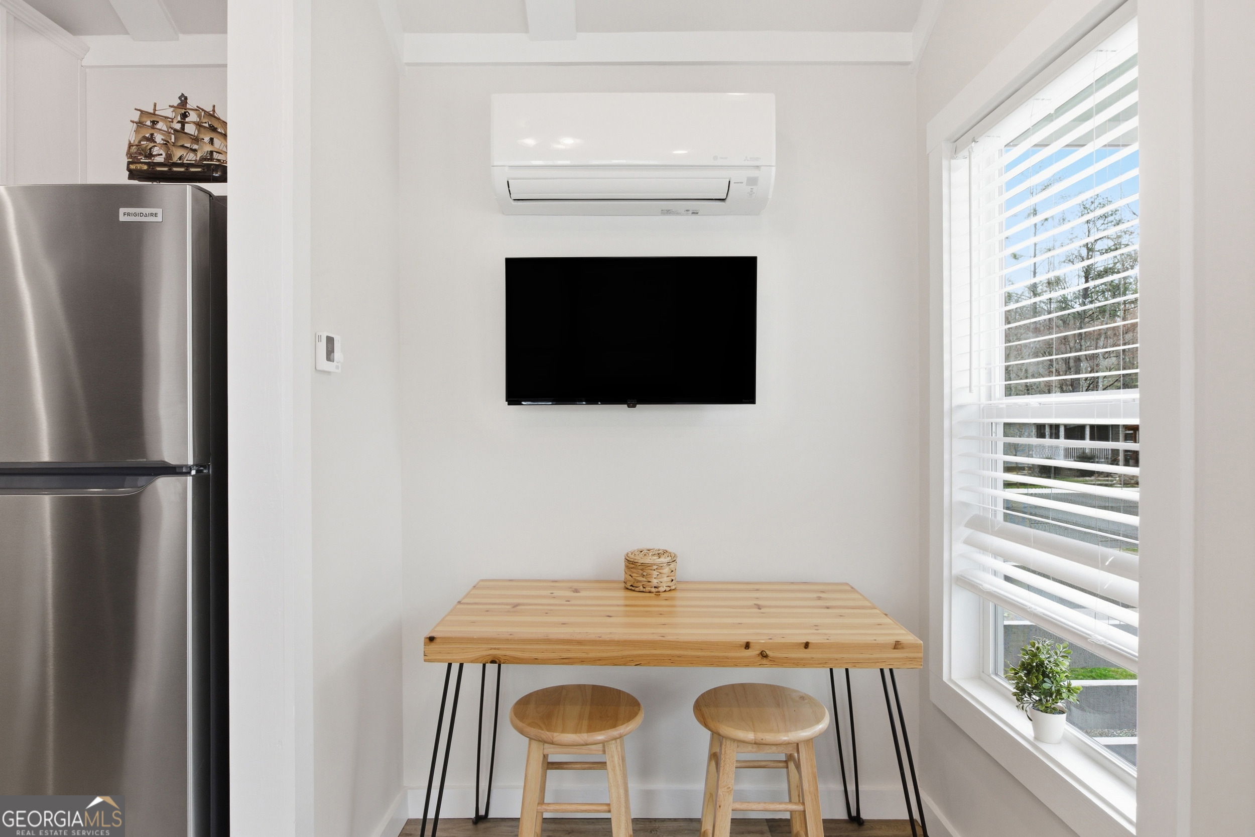 4960 Laurel Lodge Road, Unit 40 Clarkesville, GA 30523 - Photo 12 of 33 a view of a dining room with furniture window and outside view