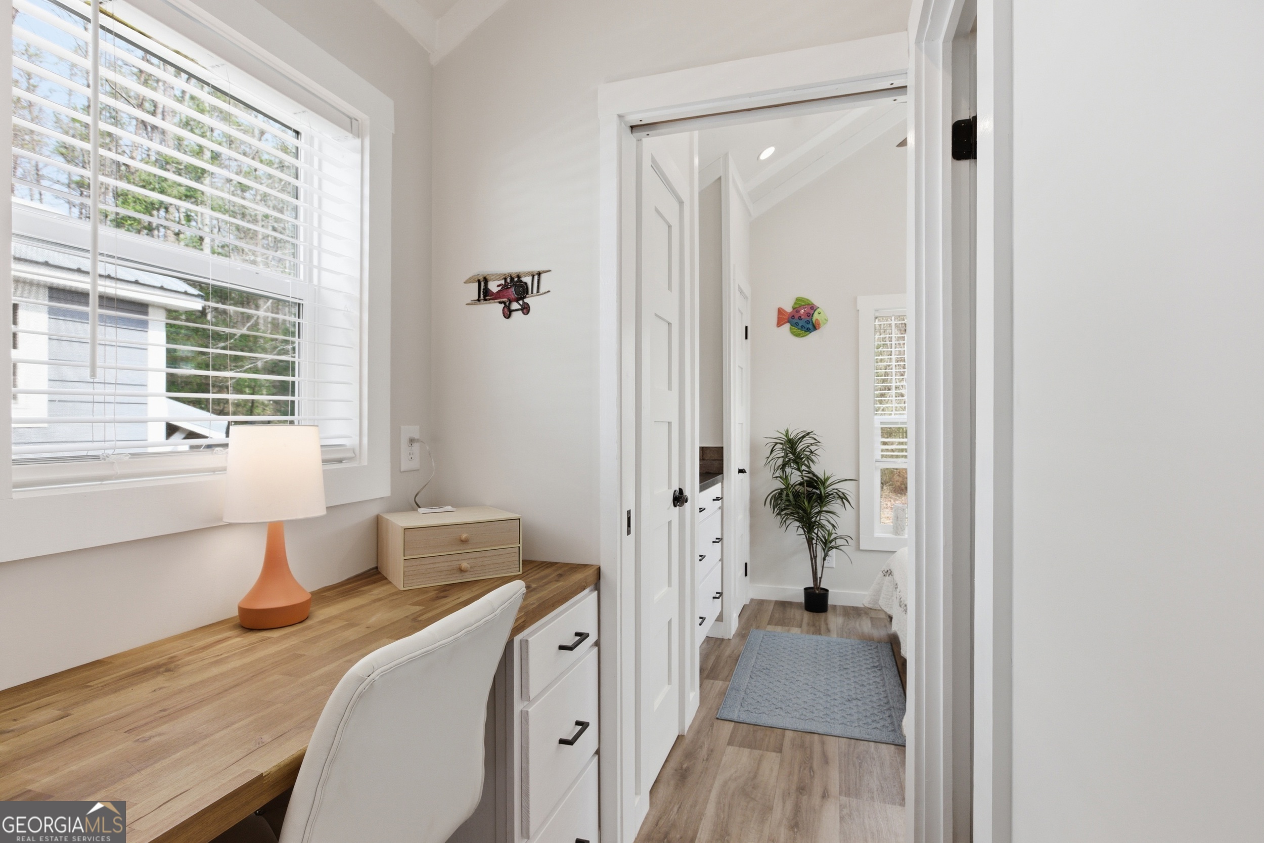 4960 Laurel Lodge Road, Unit 40 Clarkesville, GA 30523 - Photo 14 of 33 a en suite bathroom with a granite countertop sink a mirror and a shower