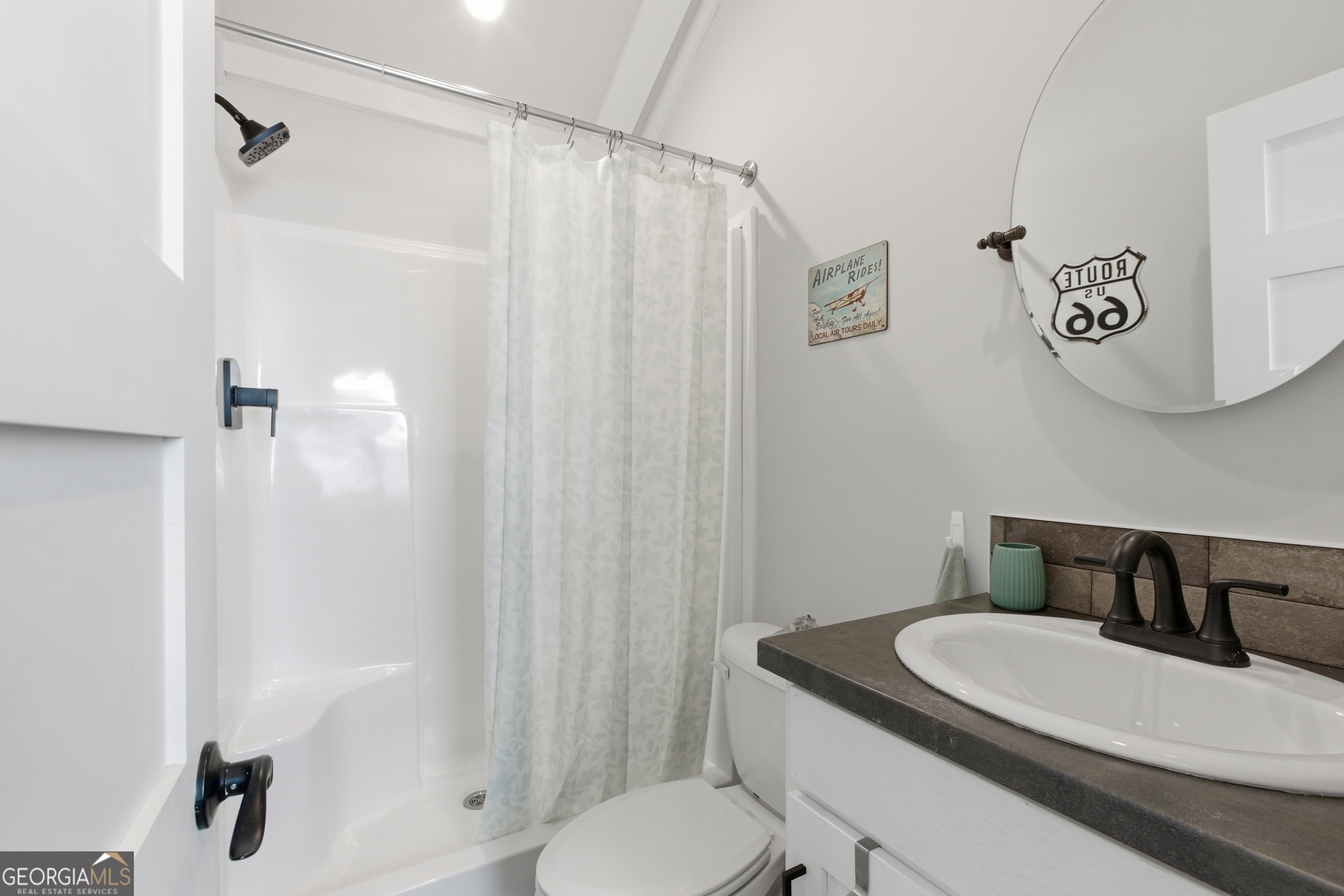 4960 Laurel Lodge Road, Unit 40 Clarkesville, GA 30523 - Photo 17 of 33 a bathroom with a sink and a mirror