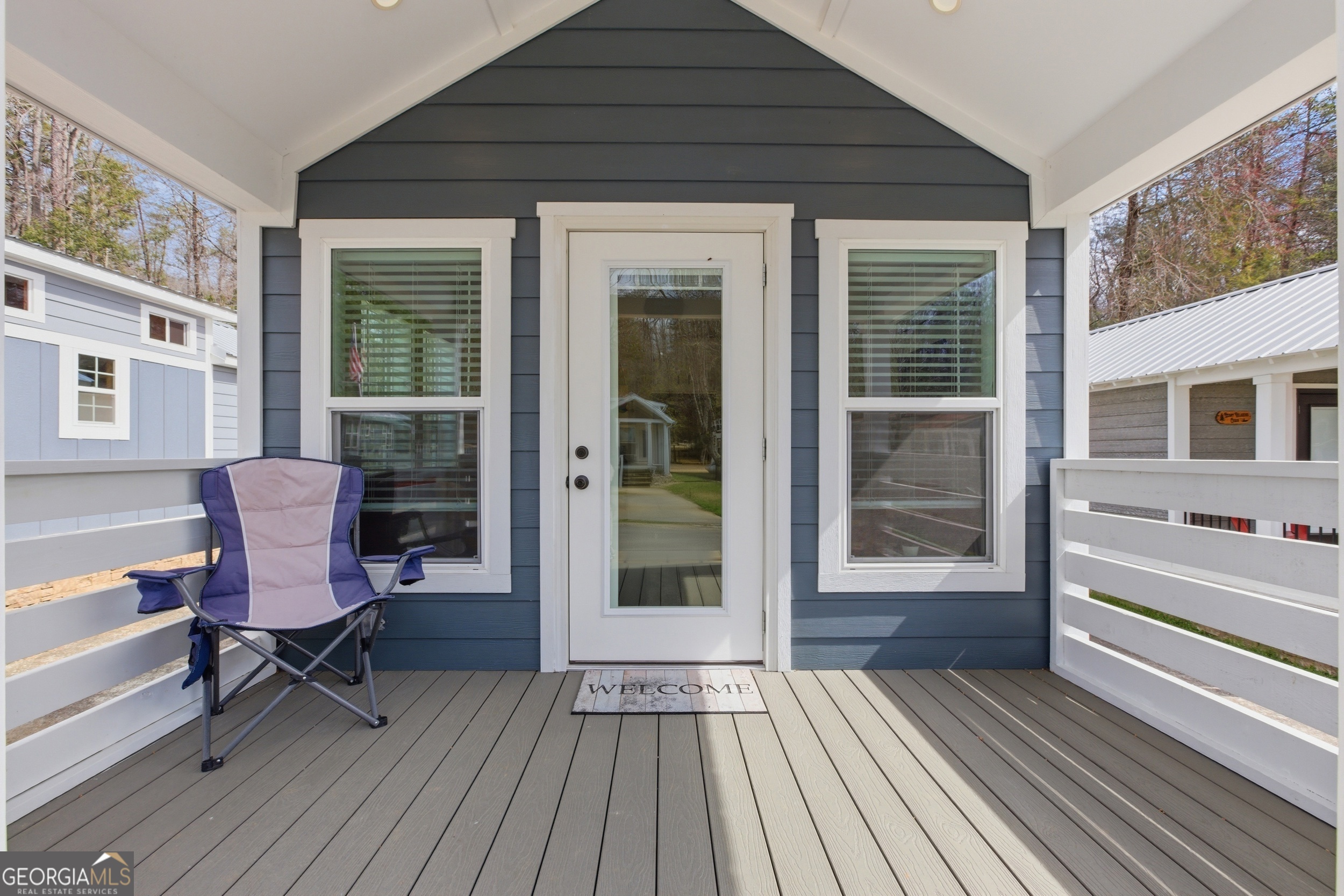 4960 Laurel Lodge Road, Unit 40 Clarkesville, GA 30523 - Photo 2 of 33 a view of a house with sitting area and wooden floor