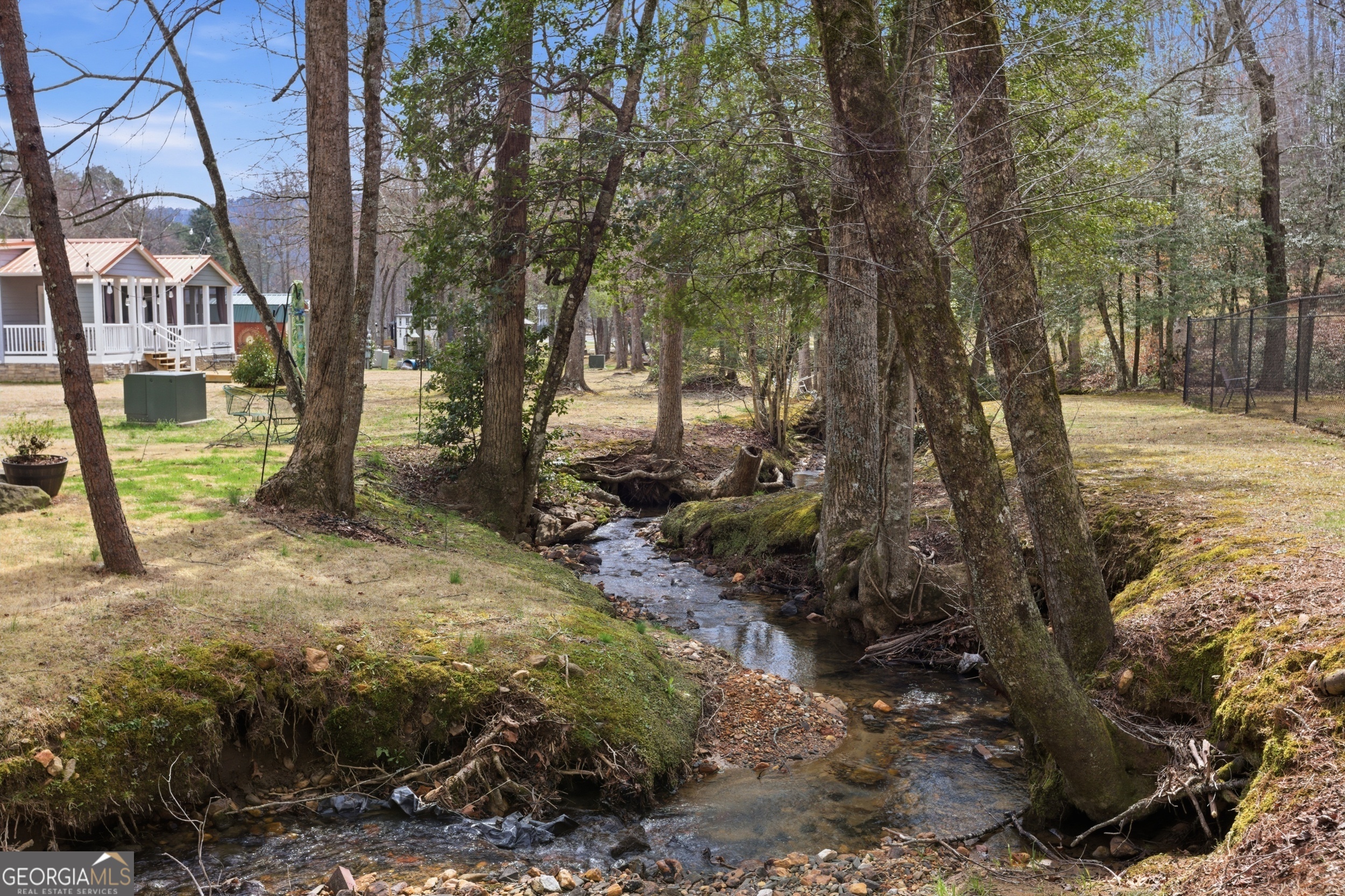 4960 Laurel Lodge Road, Unit 40 Clarkesville, GA 30523 - Photo 23 of 33 a view of a yard with plants and trees