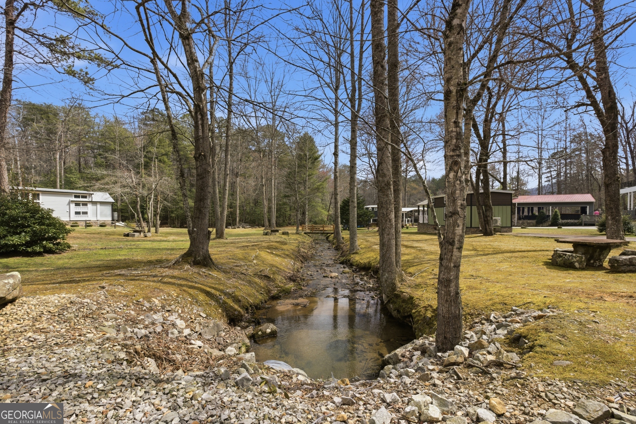 4960 Laurel Lodge Road, Unit 40 Clarkesville, GA 30523 - Photo 31 of 33 a view of a yard with trees