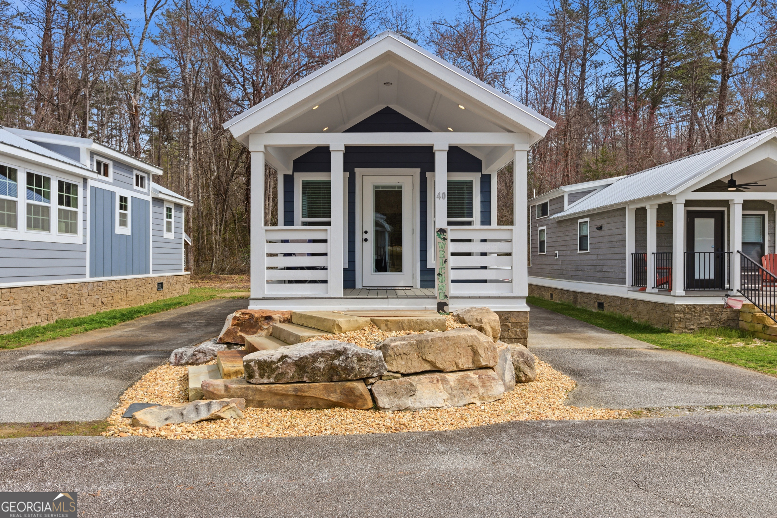 4960 Laurel Lodge Road, Unit 40 Clarkesville, GA 30523 - Photo 4 of 33 a front view of a house with a yard
