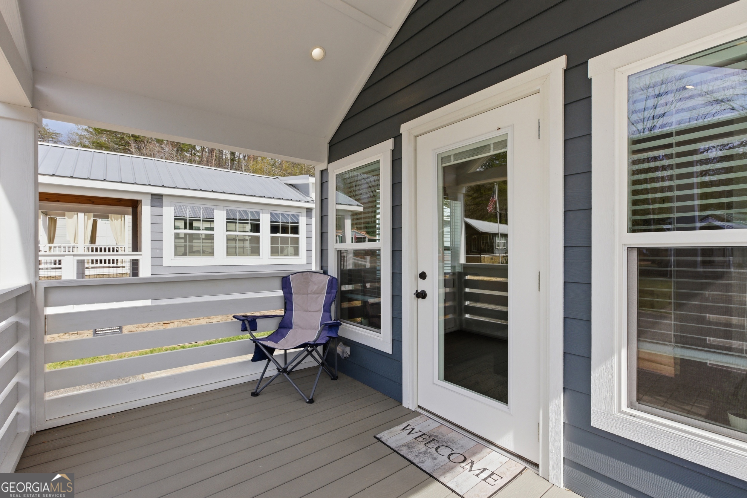 4960 Laurel Lodge Road, Unit 40 Clarkesville, GA 30523 - Photo 7 of 33 a view of a building with outdoor seating space