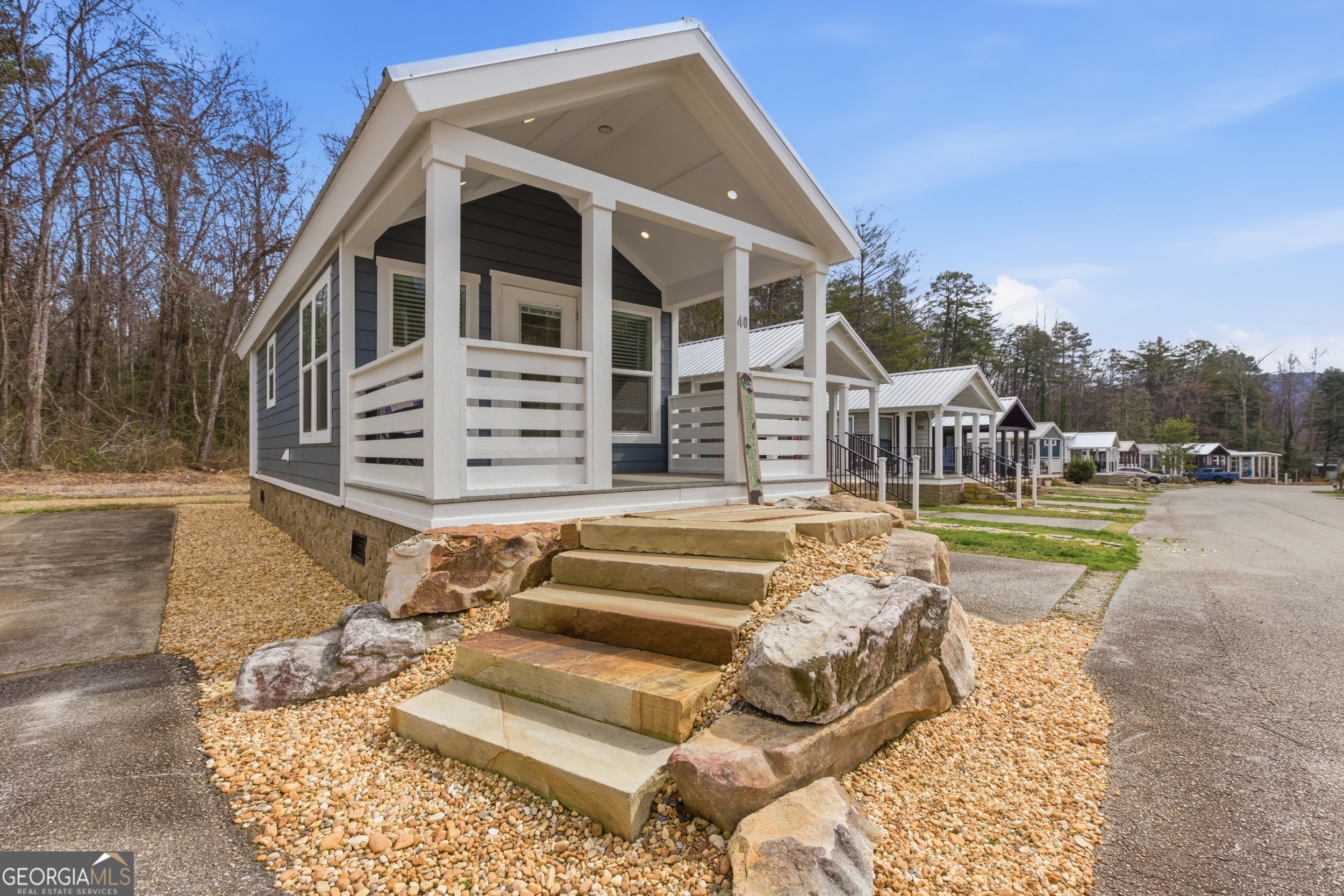 4960 Laurel Lodge Road, Unit 40 Clarkesville, GA 30523 - Photo 8 of 33 a view of a house with a yard