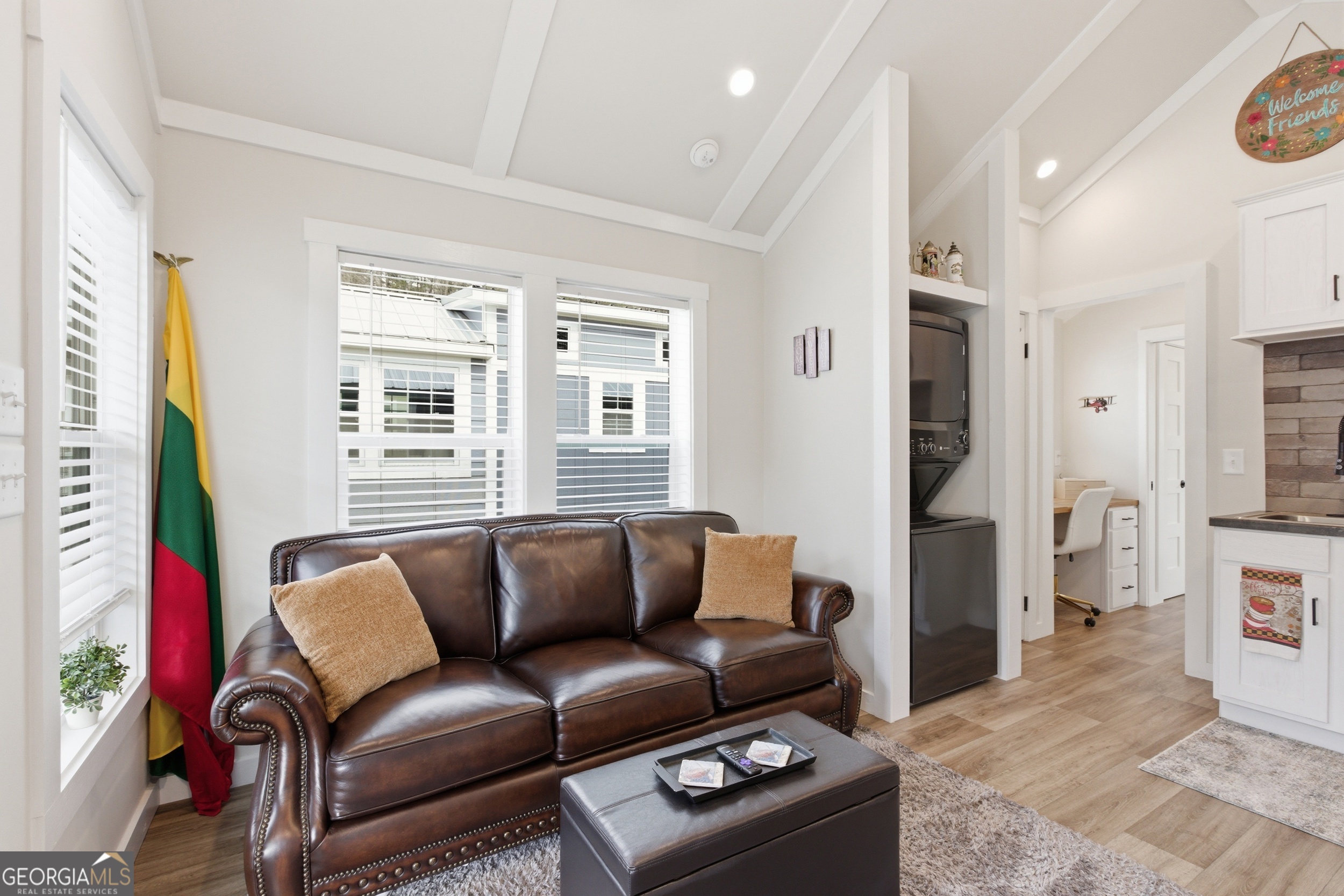 4960 Laurel Lodge Road, Unit 40 Clarkesville, GA 30523 - Photo 9 of 33 a living room with furniture a flat screen tv and a window