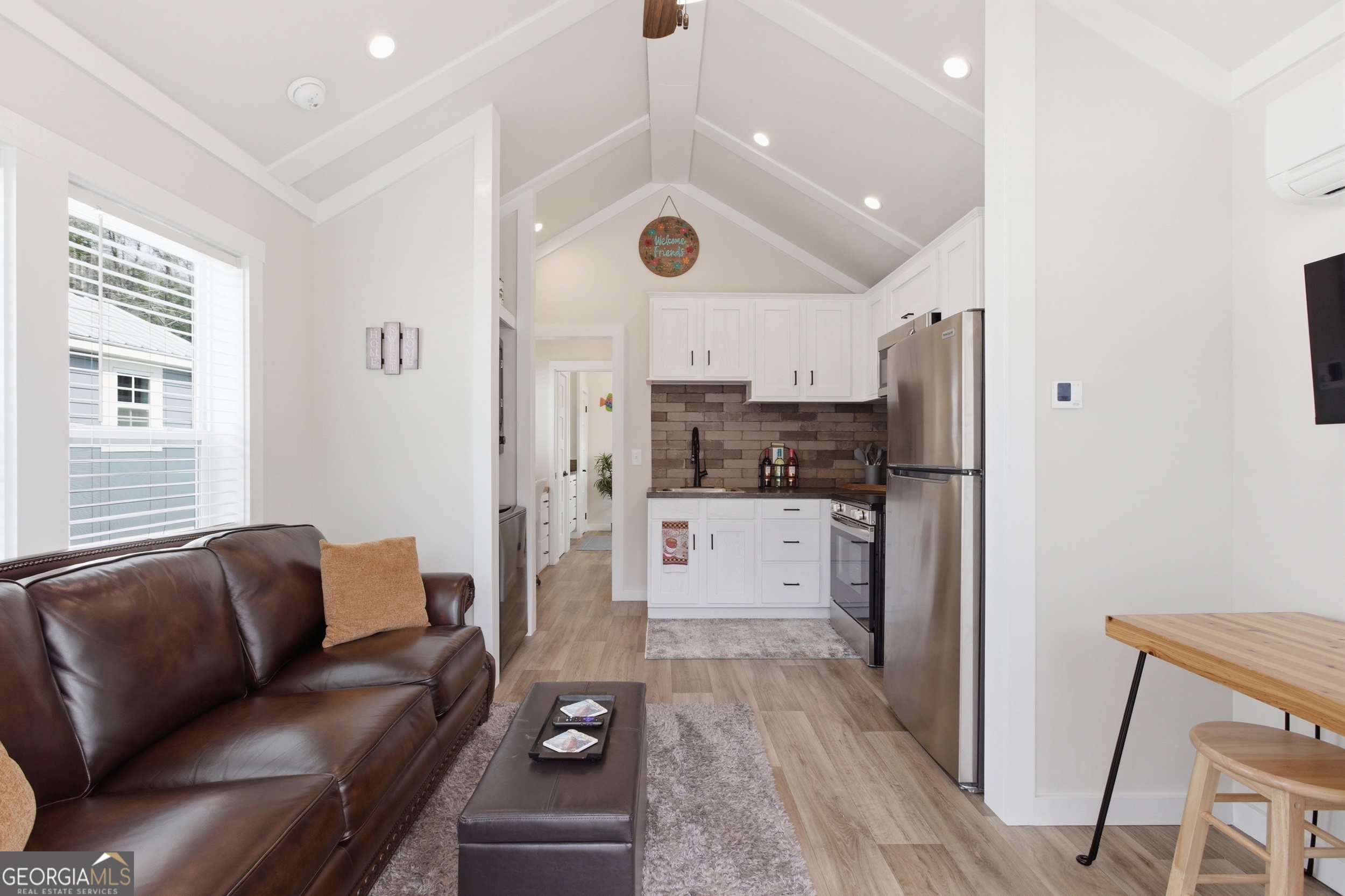 4960 Laurel Lodge Road, Unit 40 Clarkesville, GA 30523 - Photo 10 of 33 a living room with furniture and wooden floor