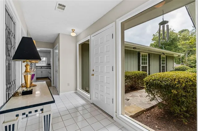 a view of kitchen and dining area with furniture