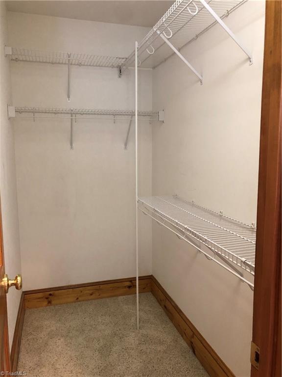 261 Running Creek Road Browns Summit, NC 27214 - Photo 14 of 28 One of the two walk-in closets in the Master - 7' 3" x 4'