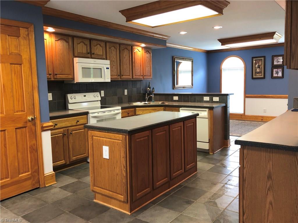 261 Running Creek Road Browns Summit, NC 27214 - Photo 8 of 28 Oversized Kitchen, designed for people who like to cook and entertain at the same time!