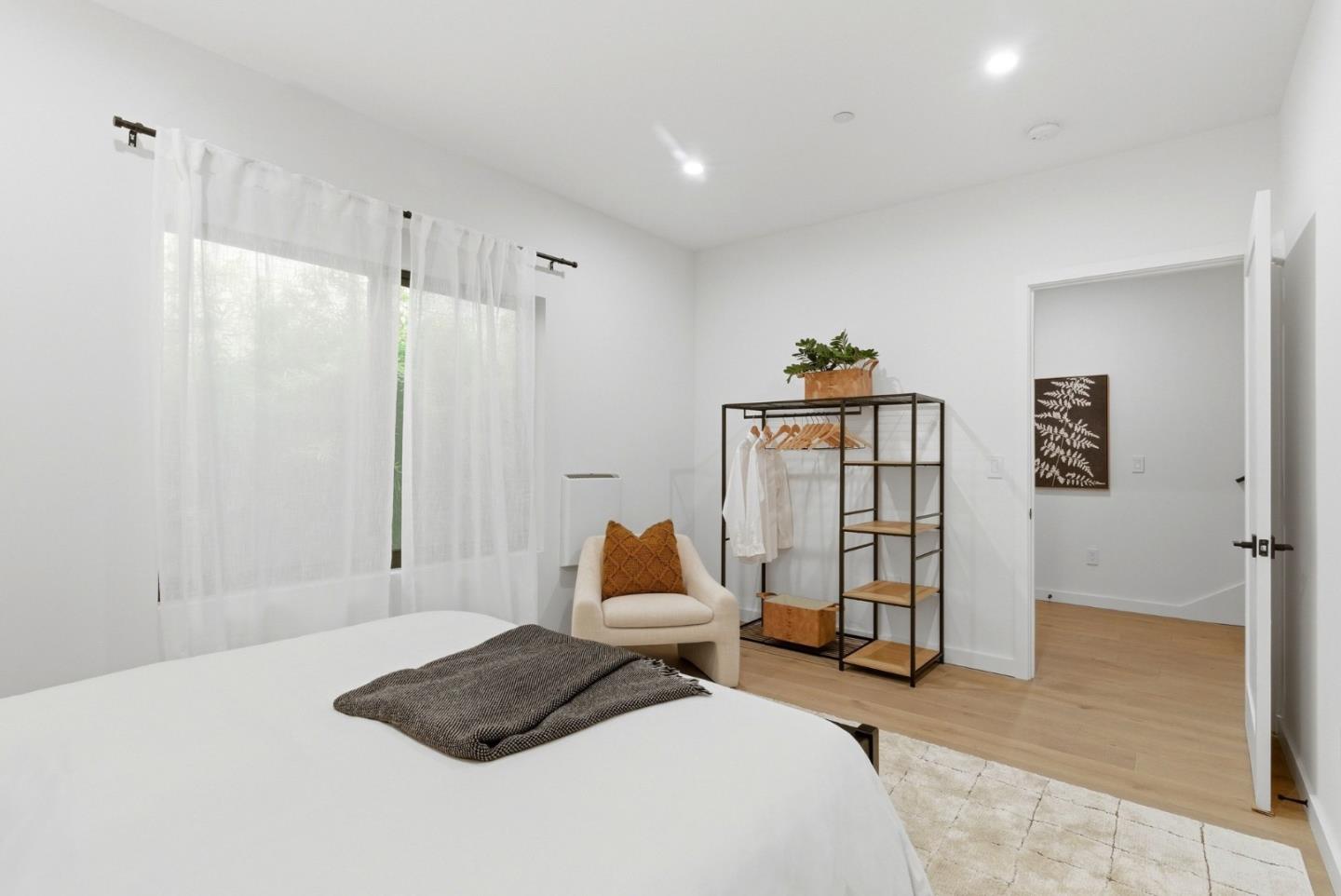 908 Woodside Road Redwood City, CA 94061 - Photo 5 of 26 a bedroom with a bed and a window