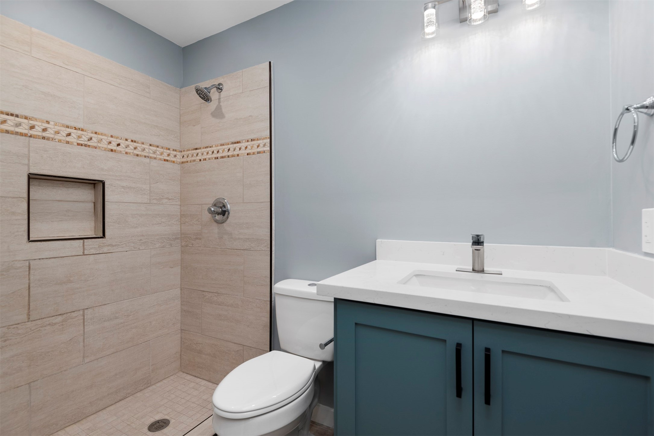5000 Milwee Street, Unit 54 Houston, TX 77092 - Photo 20 of 25 A fully redesigned second bath — custom cabinetry, quartz countertops, and thoughtful finishes throughout.