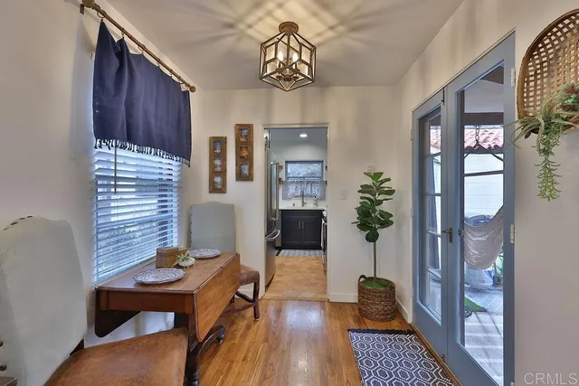 a room with furniture and wooden floor