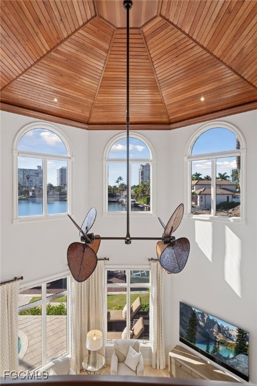 361 Pirates Bight Naples, FL 34103 - Photo 19 of 33 a room with table and chairs