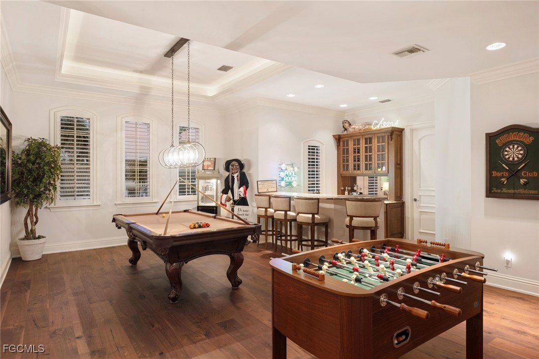 361 Pirates Bight Naples, FL 34103 - Photo 23 of 33 a living room with furniture and a table