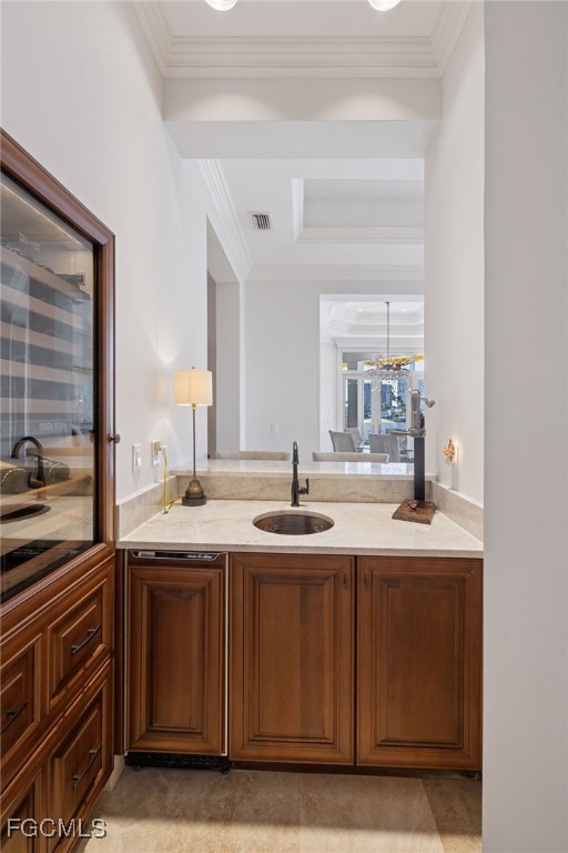 361 Pirates Bight Naples, FL 34103 - Photo 4 of 33 a kitchen with a sink and cabinets