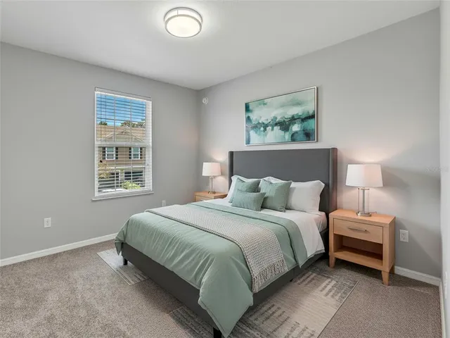a bathroom with a granite countertop sink mirror and shower