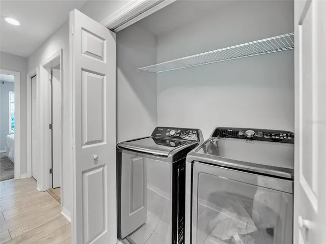 a swimming pool with outdoor seating and yard