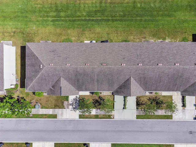 a view of a lake with a yard