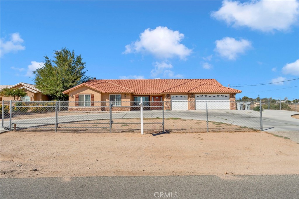 11158 Pinon Avenue Hesperia, CA 92345 - Photo 1 of 39 a view of house with street
