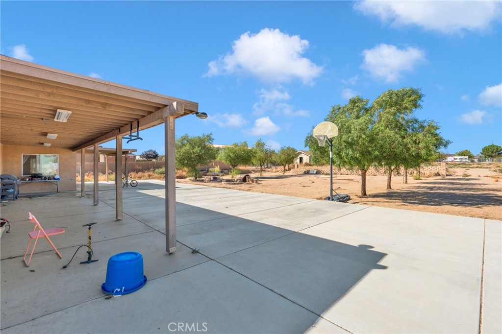 11158 Pinon Avenue Hesperia, CA 92345 - Photo 27 of 39 a street view with patio