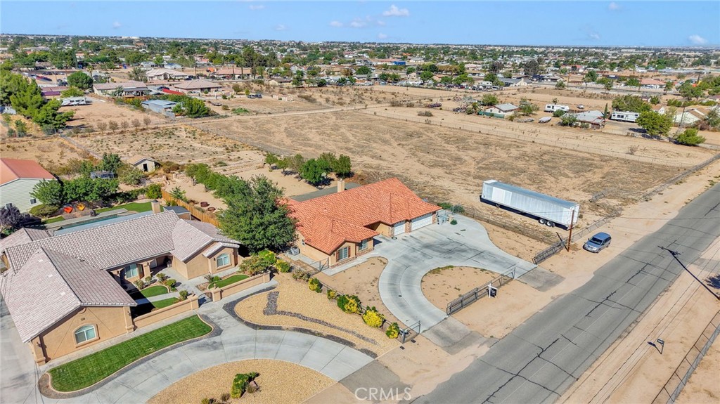 11158 Pinon Avenue Hesperia, CA 92345 - Photo 32 of 39 an aerial view of residential houses with outdoor space