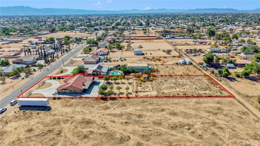 11158 Pinon Avenue Hesperia, CA 92345 - Photo 34 of 39 an aerial view of residential houses with outdoor space