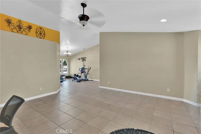 a view of a livingroom with furniture and a chandelier
