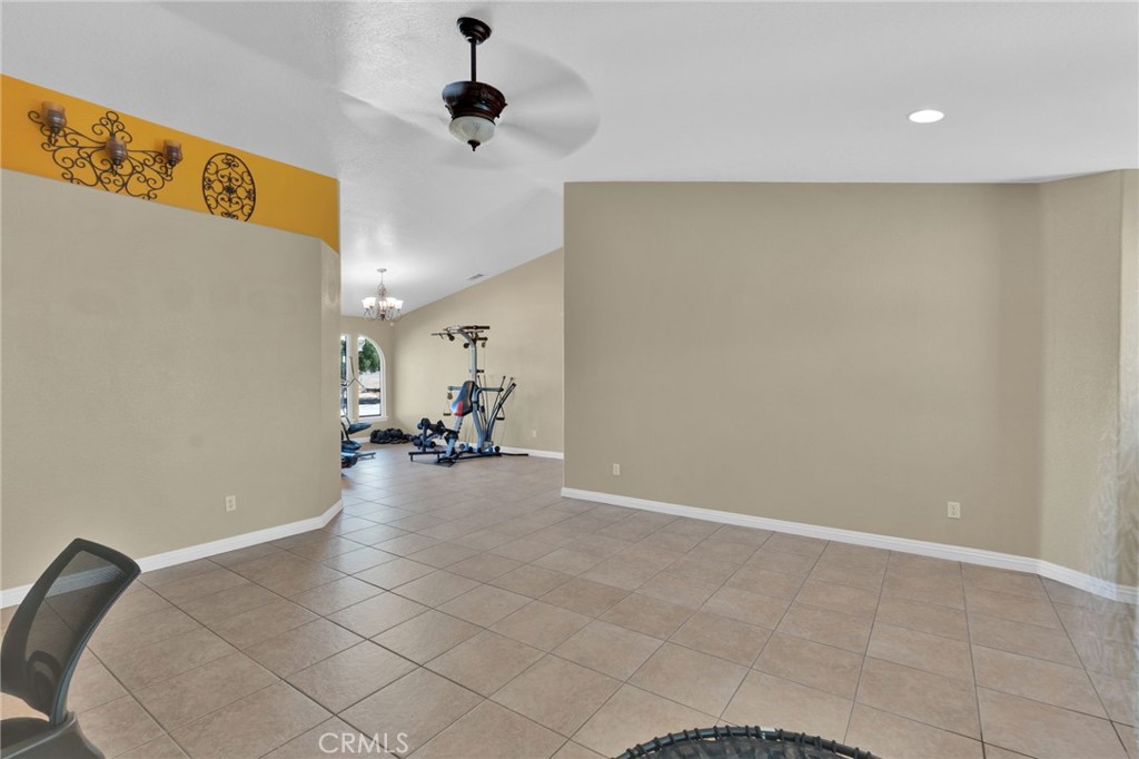 11158 Pinon Avenue Hesperia, CA 92345 - Photo 5 of 39 a view of a livingroom with furniture and a chandelier