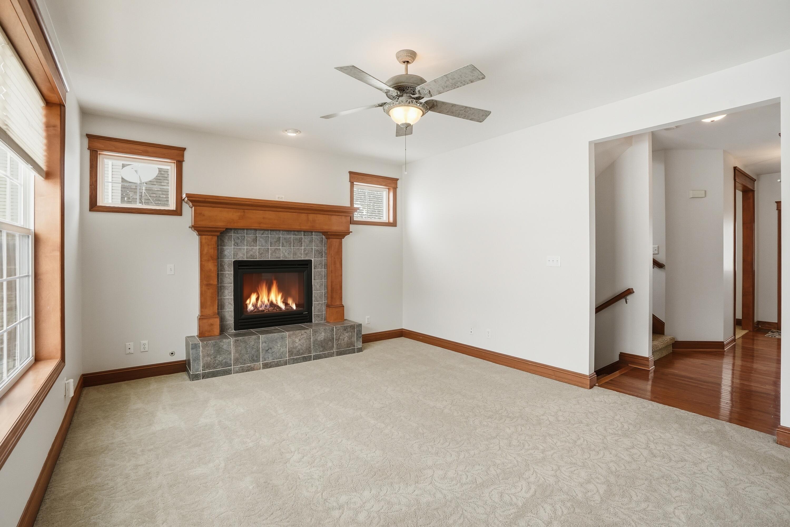 1144 Mary Ellen Drive Crown Point, IN 46307 - Photo 12 of 47 a view of an empty room with a fireplace
