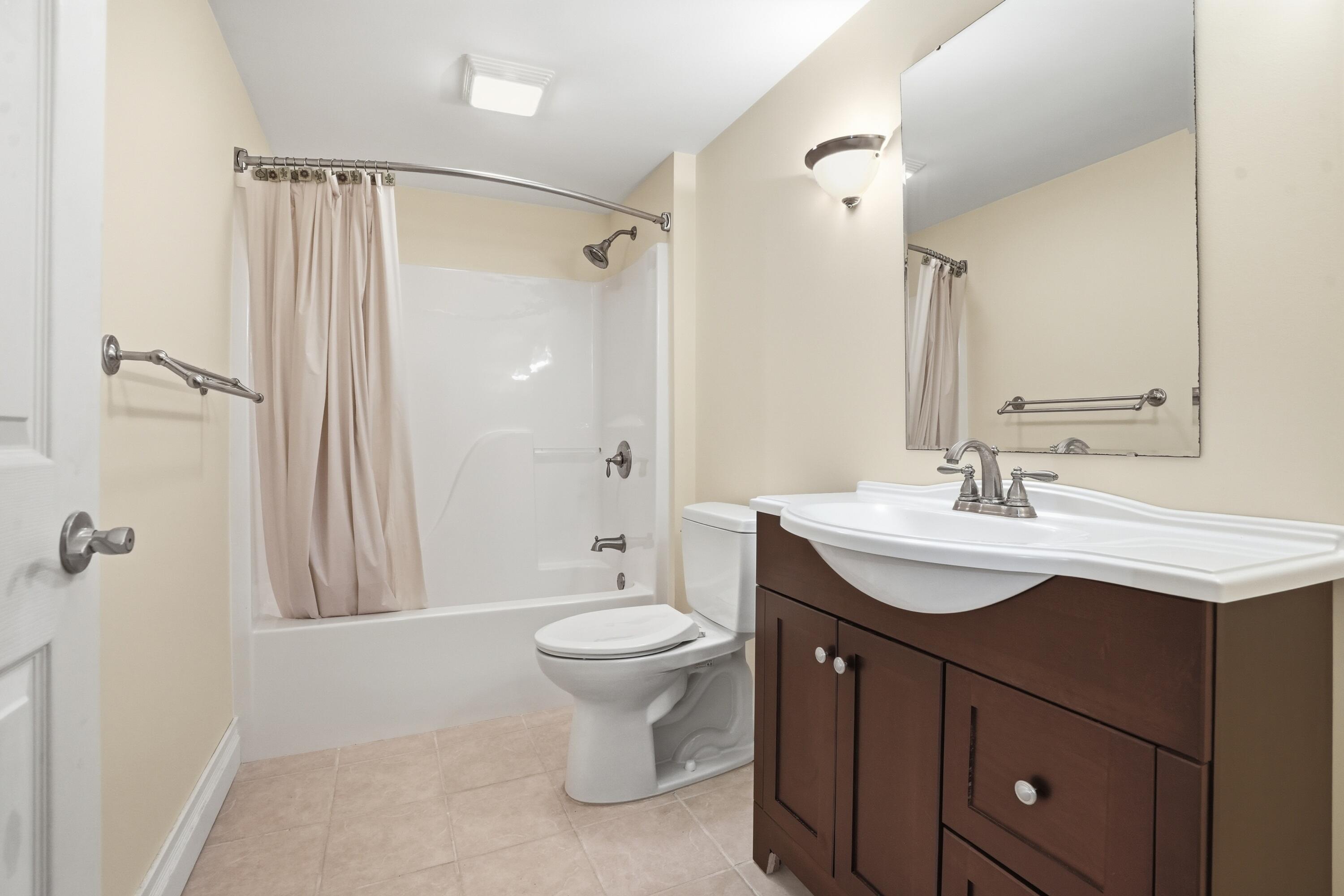 1144 Mary Ellen Drive Crown Point, IN 46307 - Photo 32 of 47 a bathroom with a granite countertop sink toilet and shower