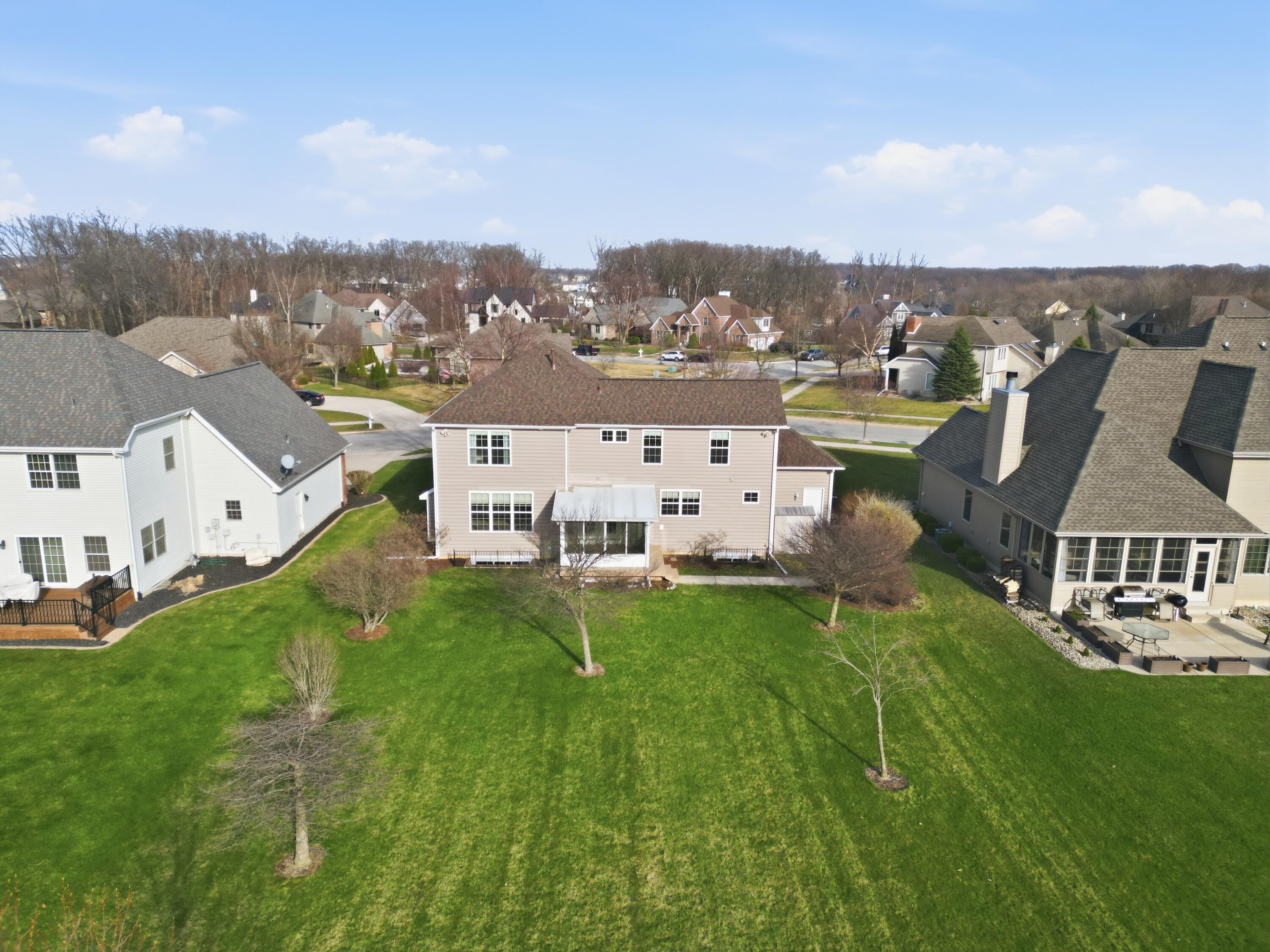 1144 Mary Ellen Drive Crown Point, IN 46307 - Photo 40 of 47 an aerial view of residential houses with outdoor space and trees
