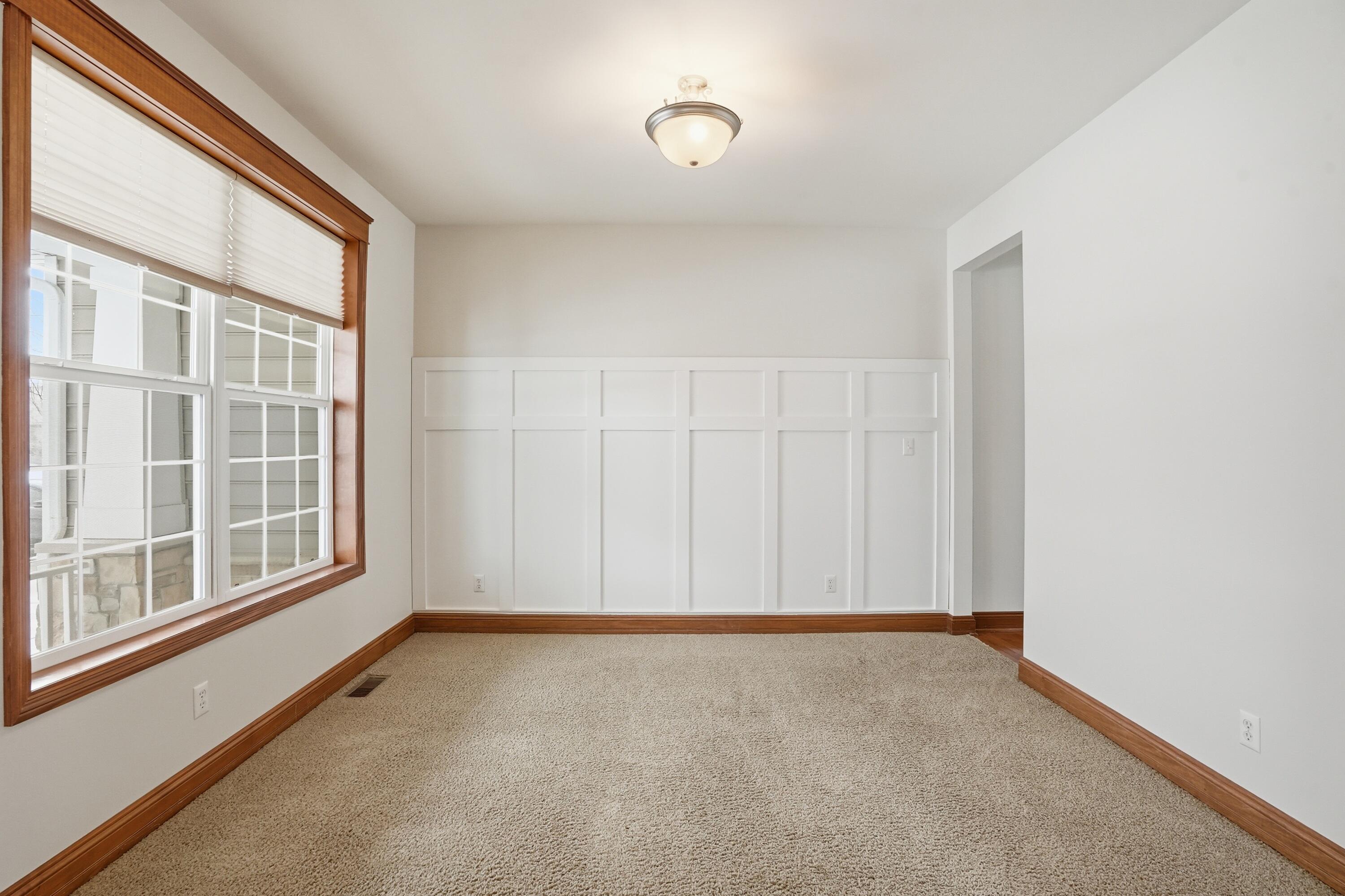 1144 Mary Ellen Drive Crown Point, IN 46307 - Photo 9 of 47 a view of an empty room with a window