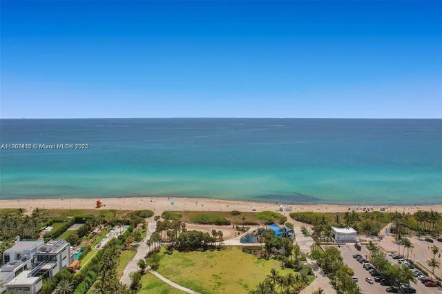 a front view of a building with parking space