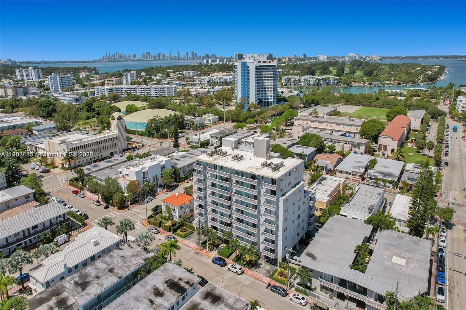 7620 Carlyle Avenue, Unit 703 Miami Beach, FL 33141 - Photo 29 of 46 an aerial view of residential building and parking space